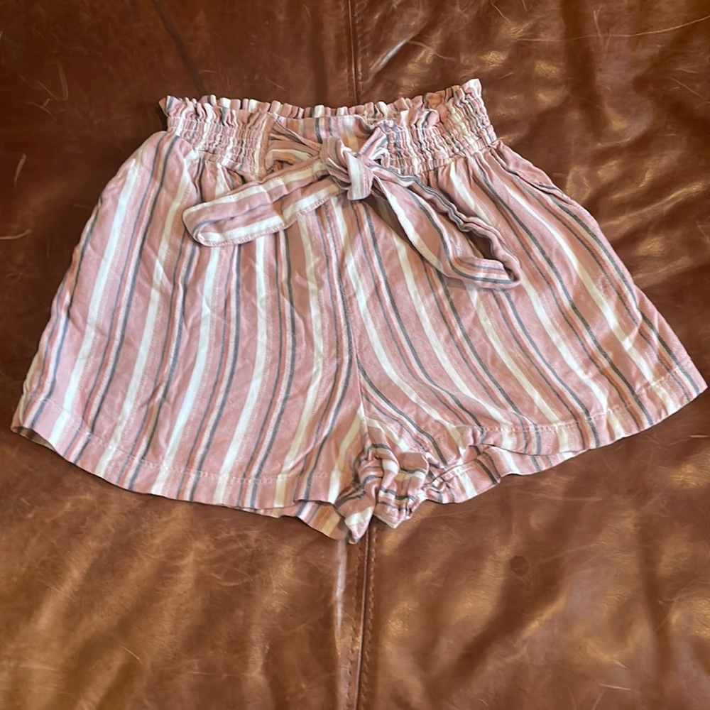 I am selling these adorable pink, grey, and white striped high rise soft shorts!